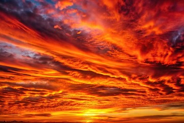 Fototapeta premium A breathtaking display of red and orange hues in the fiery sky at dusk, atmospheric scene, vibrant colors