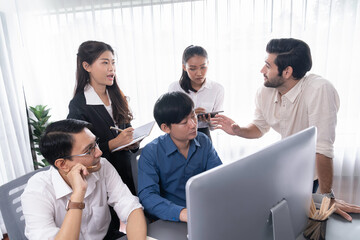 Group of diverse office worker employee working together on strategic business marketing planning in corporate office room. Positive teamwork in business workplace concept. Prudent