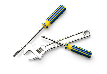 Screwdriver and wrench isolated on white
