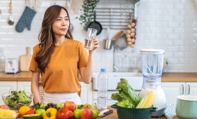 Portrait asian beauty body slim woman drinking water from a bottle while relax and feeling fresh, refresh drink, wellness, diet, healthcare, mineral at home.Healthy liquid lifestyle concept