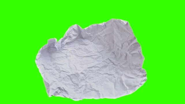 unwrapping crumpled paper stop motion animation isolated on green screen