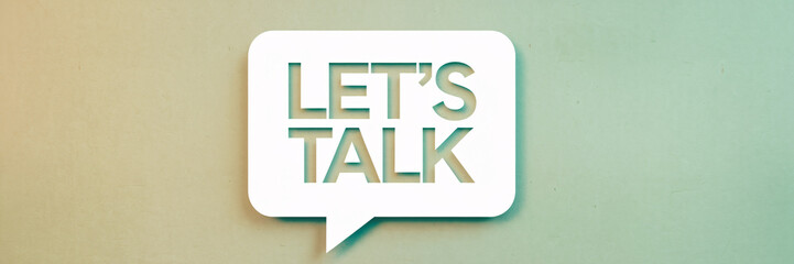 "Let's Talk" text in minimalist speech bubble design on gradient background, symbolizing conversation, communication, and dialogue. Ideal for marketing, business, and discussion themes.