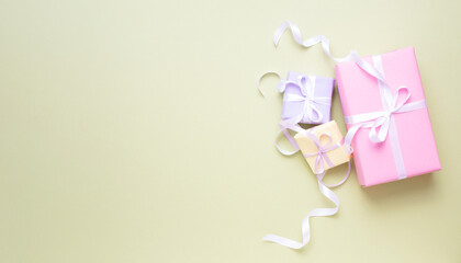 Pastel gift boxes with ribbons 