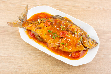 Chinese food tomato sweet and sour fish