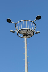 Sport light post or lamp pole with blue sky background