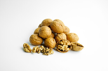 Ripe dry split walnut. Walnuts Isolated on White Background. closeup of shelled organic walnut halves. walnut, nut, full depth of field