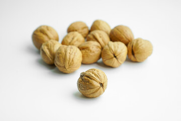 Ripe dry split walnut. Walnuts Isolated on White Background. closeup of shelled organic walnut halves. walnut, nut, full depth of field