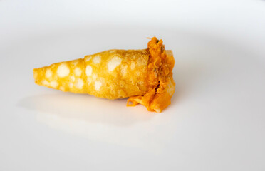 Traditional savory straws stuffed with chicken and hearts of palm