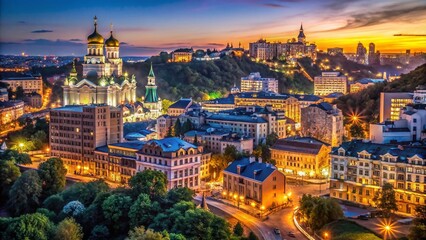 Obraz premium Night Urban Cityscape of Kyiv: Illuminated Buildings in Podil, Ukraine