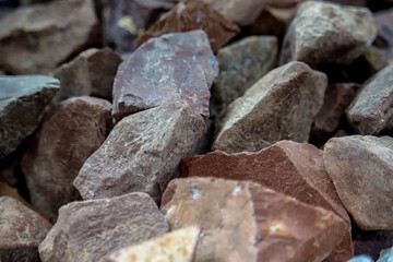 Various brown stones of different sizes