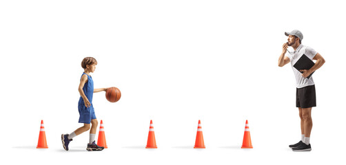 Basketball coach and a boy at training class