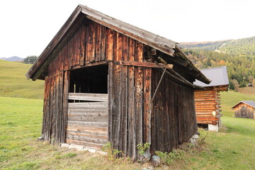 an old little crooked hut in the alps