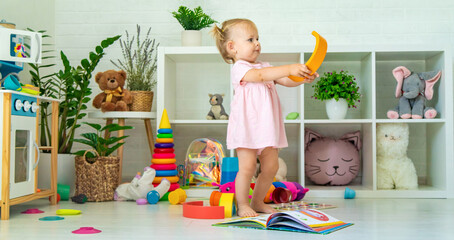 little girl playing with toys. Selective focus