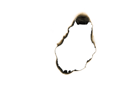 burned hole white paper background texture. Burn in paper with brown edges and flames isolated on a transparent background