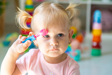 little girl playing with toys. Selective focus