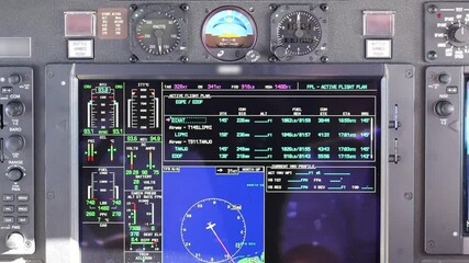 navigation instruments screens plane cockpit flight information displayed perspective insight into complexities close up view displays video aviation technology operations  - Powered by Adobe