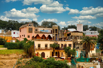 Obraz premium Several old houses in a ravine in the bohemian district of Barranco in Lima, Peru