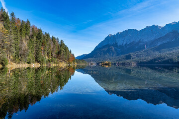 Autumn colors in fall at lake Eibsee, Garmisch-Partenkirchen, Bavarian alps, Germany