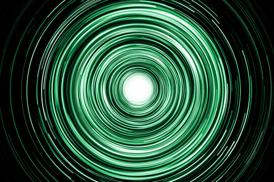 Neon circle lines with empty copy space isolated on black background. Colorful led lights long exposure rotation photo. Eco shiny light glow. Cosmos space planet abstraction. Green blue vortex spiral.
