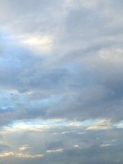 Fluffy White Clouds in a Blue Sky as A Skyscape Background