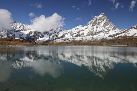 Mountain lake Lac de Goillet with a view of the Matterhorn, Aosta valley, Italy