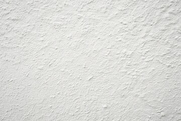 Concrete background with a white plain texture, captured from a low angle