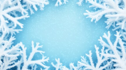 A frosty white winter frame with copy space against a light blue background.