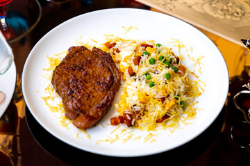 Authentic Brazilian food, grilled picanha steak with birobiro rice