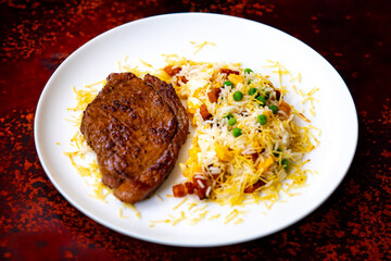 Authentic Brazilian food, grilled picanha steak with birobiro rice