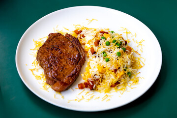 Authentic Brazilian food, grilled picanha steak with birobiro rice