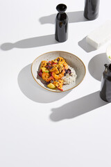 Minimalist Asian Cuisine Shrimp with Vegetables and Steamed Rice in High-Contrast Lighting