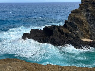 waves crashing on rocks