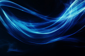 Obraz premium abstract representation of blue waves flowing against a dark background