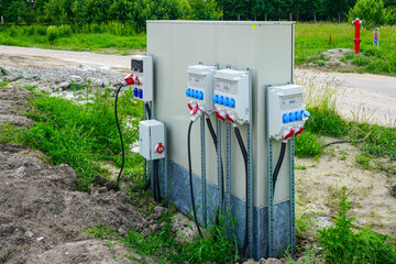 New modern electricity distribution box at new residential house construction site