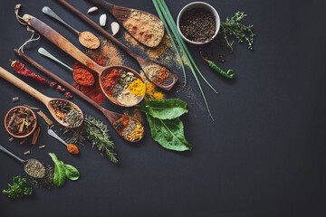 Kitchen, spices and herbs on table for culinary ingredients, flavor and mockup space with leaves for cooking. Seeds, powder and above counter with meal prep, curry and variety for food at restaurant