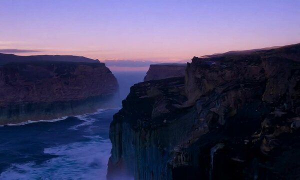 Dolly shot with soft, twilight light: The camera starts with a close-up of a subduction zone. It then dolly&rsquo;s backward to reveal the subduction zone and surrounding features bathed in soft, twilight l