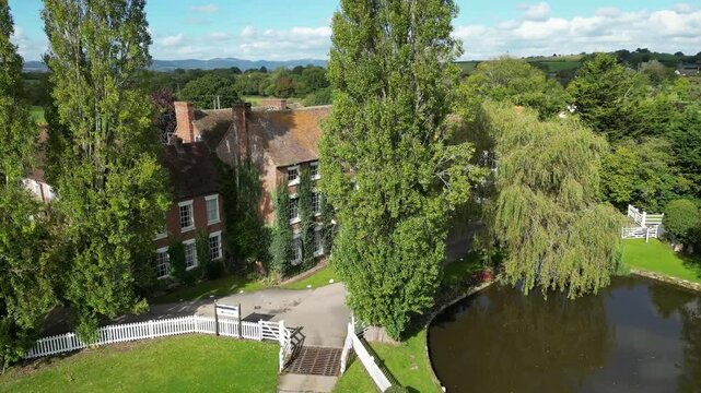 luxury mansion serves hotel property england elegant architecture beautiful surroundings highlight appeal real circling aerial drone shot estate uk scenic view investment unique 
