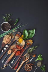 Kitchen, spices and curry on table for culinary ingredients, flavor and mockup space with leaves for cooking. Seeds, powder and above counter with meal prep, herbs and variety for food at restaurant