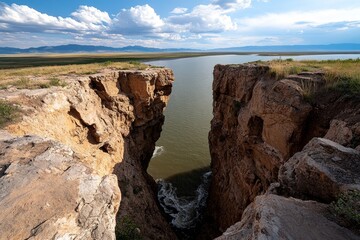 Fototapeta premium Marfa's coastal cliffs, with waves crashing against the rocks and the open Mediterranean stretching into the horizon