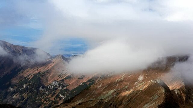 ast clouds in the Carpathians, beautiful nature in the autumn landscape, mountain peaks, mountain ridges. High Tatras National Park