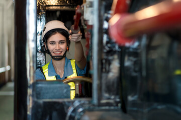 Engineer checking construction process railway and checking work on railroad station . Railway engineer checking machines in train station. Train engineer concept