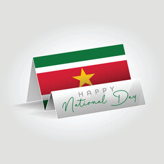Suriname country paper flag standing on the ground. Happy national day flag design.