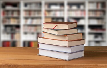 Reading Books set on wooden table in library