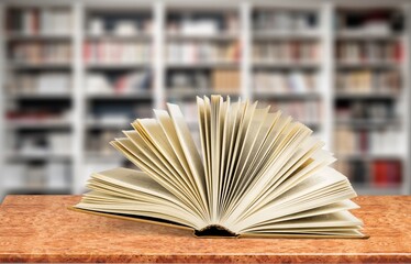 Reading Books set on wooden table in library