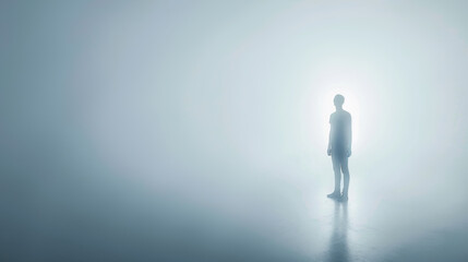 Obraz premium Silhouette of a person standing in soft light on blue background