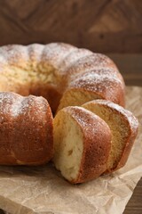 Freshly baked sponge cake on table, closeup