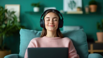 Young woman relaxing with headphones while using a laptop at home. Comfort and leisure concept.