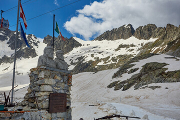 Lago del Monticello, Passo Paradiso in Val Di Sole surrounded by snow in the middle of summer