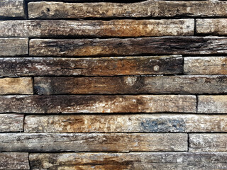 Old boards stacked in rows. Background for design