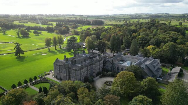 grandeur matfen hall luxurious country house hotel spa set amidst picturesque golf course newcastle england circling aerial drone luxury estate mansion scenic nature landscape exploration 